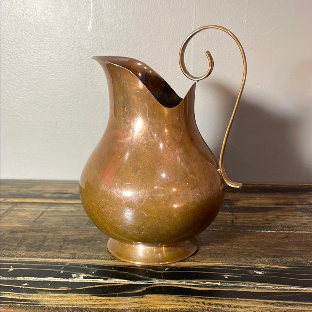 Copper jug with beautiful swirl handle - this one is a beautiful accent piece!